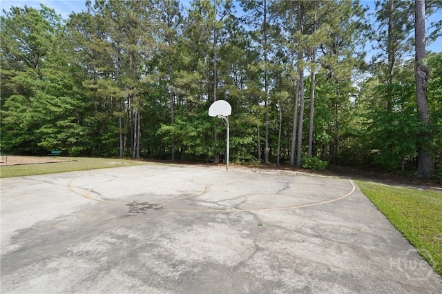 227 Chippingwood Cir, Pooler, GA 31322 - view of basketball court featuring community basketball court and a yard