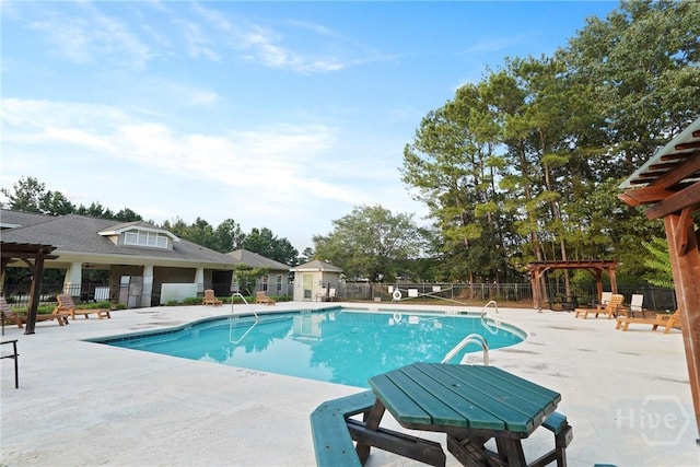 227 Chippingwood Cir, Pooler, GA 31322 - community pool with a pergola and a patio area