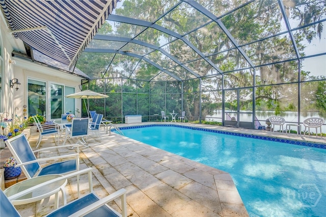 24 Islanders Retreat Retreat, Savannah, GA 31411 - outdoor pool with a patio area, glass enclosure, and outdoor dining space
