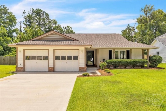 237 Robinson Loop, Richmond Hill, GA 31324 - view of front of property with a garage, driveway, roof with shingles, and brick siding