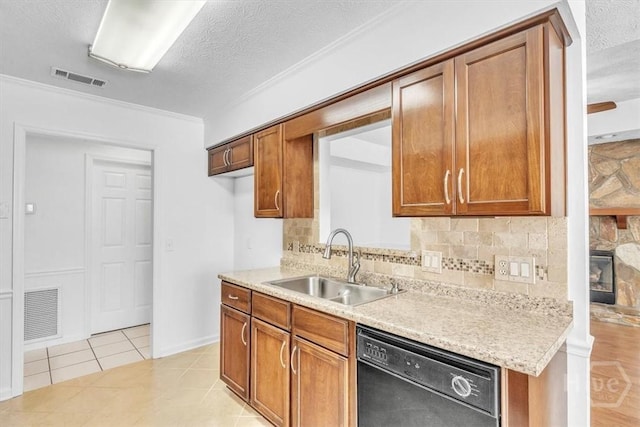 237 Robinson Loop, Richmond Hill, GA 31324 - kitchen featuring dishwasher, decorative backsplash, brown cabinetry, light countertops, and a textured ceiling