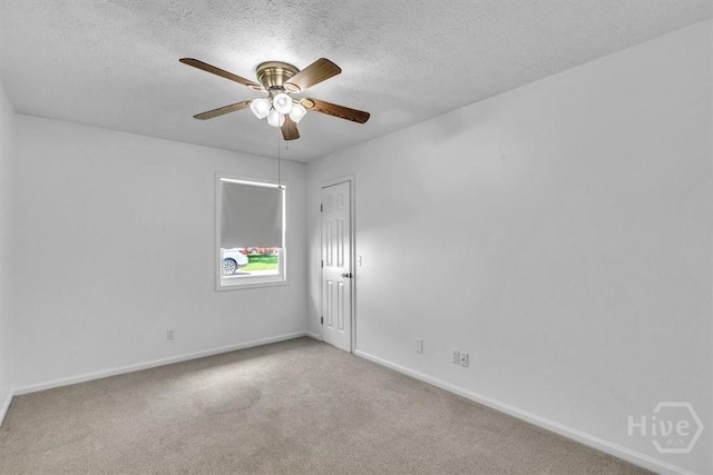 237 Robinson Loop, Richmond Hill, GA 31324 - empty room with carpet, a ceiling fan, and a textured ceiling