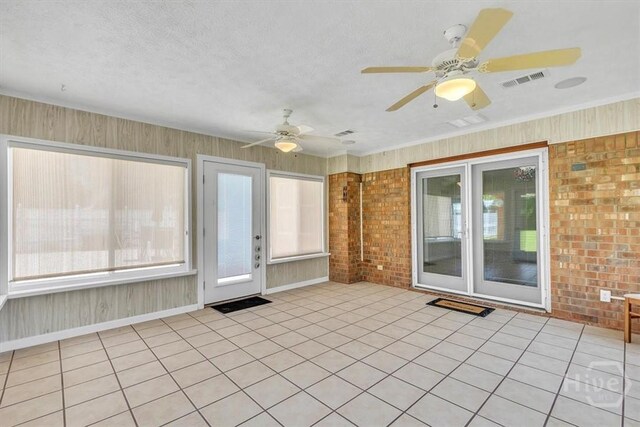 237 Robinson Loop, Richmond Hill, GA 31324 - unfurnished sunroom featuring a ceiling fan