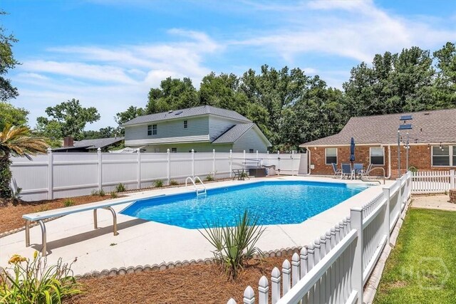 237 Robinson Loop, Richmond Hill, GA 31324 - view of swimming pool with a patio and a fenced backyard