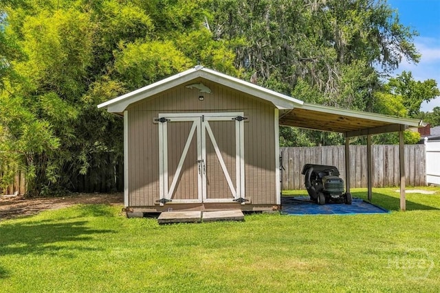 237 Robinson Loop, Richmond Hill, GA 31324 - view of shed featuring a carport