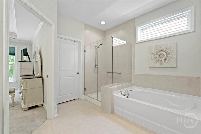 137 Harvest Hl, Pooler, GA 31322 - full bathroom featuring a bath, a stall shower, and tile patterned flooring