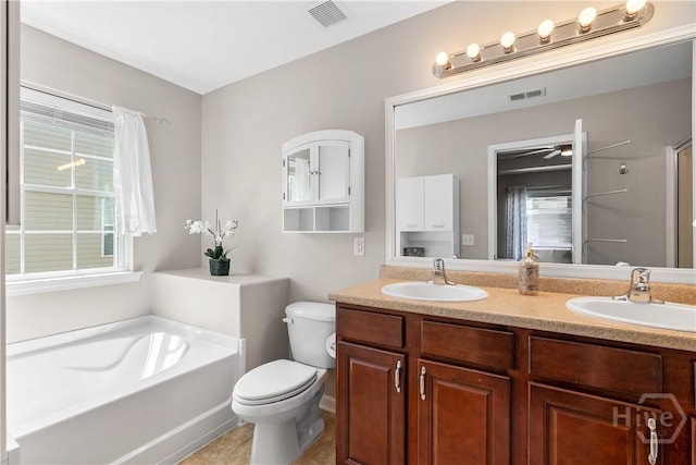 9 Melody Dr, Pooler, GA 31322 - full bath featuring double vanity, a garden tub, a ceiling fan, and tile patterned flooring