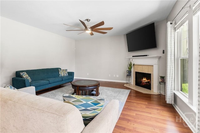 9 Melody Dr, Pooler, GA 31322 - living area featuring a ceiling fan, wood finished floors, and a fireplace