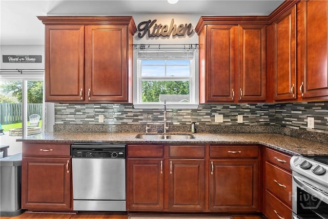 9 Melody Dr, Pooler, GA 31322 - kitchen featuring appliances with stainless steel finishes, decorative backsplash, and dark stone counters