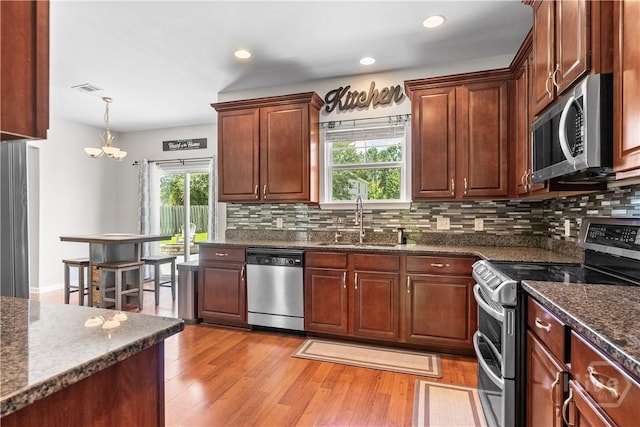 9 Melody Dr, Pooler, GA 31322 - kitchen with appliances with stainless steel finishes, plenty of natural light, tasteful backsplash, and recessed lighting
