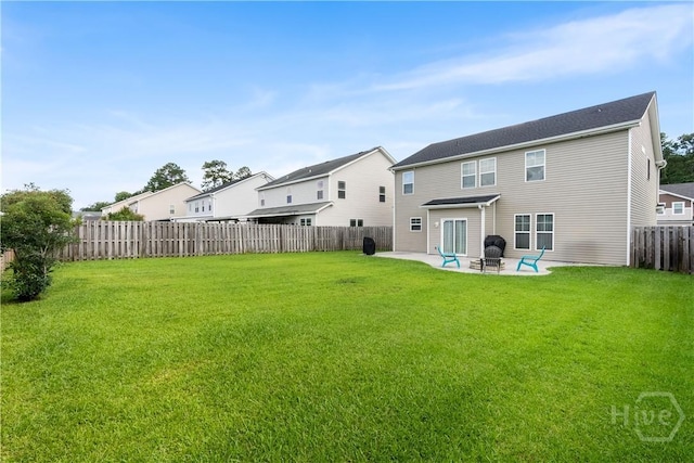 9 Melody Dr, Pooler, GA 31322 - back of house featuring a patio, a fenced backyard, and a residential view
