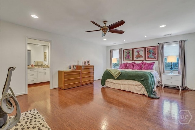 102 Phyllis Dr, Savannah, GA 31419 - bedroom featuring wood finished floors, recessed lighting, a ceiling fan, and ensuite bath