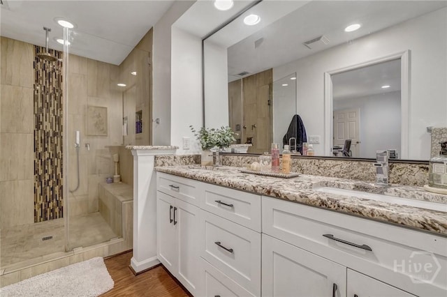 102 Phyllis Dr, Savannah, GA 31419 - full bath with a shower stall, double vanity, wood finished floors, and recessed lighting