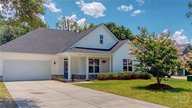 110 Tailwind Trl, Guyton, GA 31312 - modern farmhouse with an attached garage, a front yard, concrete driveway, covered porch, and a shingled roof