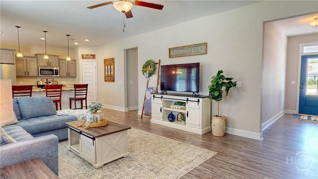110 Tailwind Trl, Guyton, GA 31312 - living area with a ceiling fan, wood finished floors, and recessed lighting