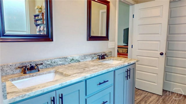 110 Tailwind Trl, Guyton, GA 31312 - full bath featuring double vanity and wood finished floors