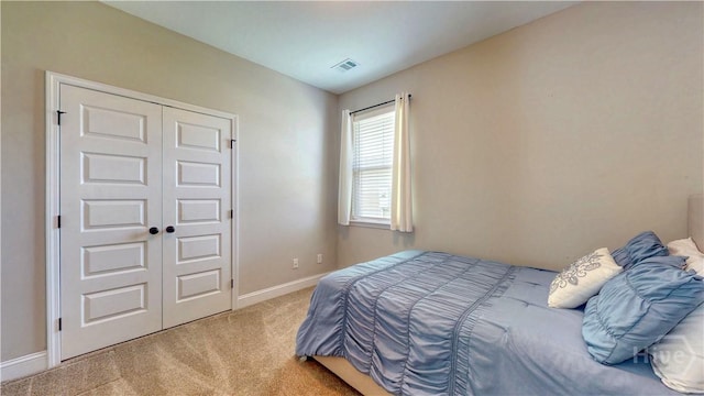 110 Tailwind Trl, Guyton, GA 31312 - carpeted bedroom with baseboards and a closet