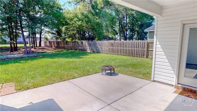 110 Tailwind Trl, Guyton, GA 31312 - fenced backyard with a patio area