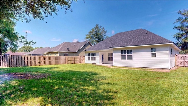 110 Tailwind Trl, Guyton, GA 31312 - back of property with a fenced backyard and roof with shingles