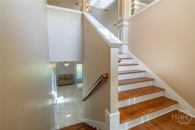9 Sweetwater Ct, Savannah, GA 31419 - stairs with a towering ceiling and ceiling fan