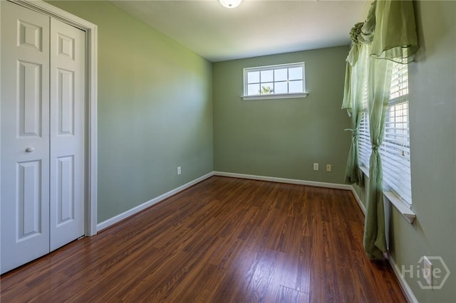 9 Sweetwater Ct, Savannah, GA 31419 - unfurnished bedroom with dark wood finished floors and baseboards