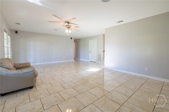 9 Sweetwater Ct, Savannah, GA 31419 - unfurnished living room with a ceiling fan and light tile patterned floors