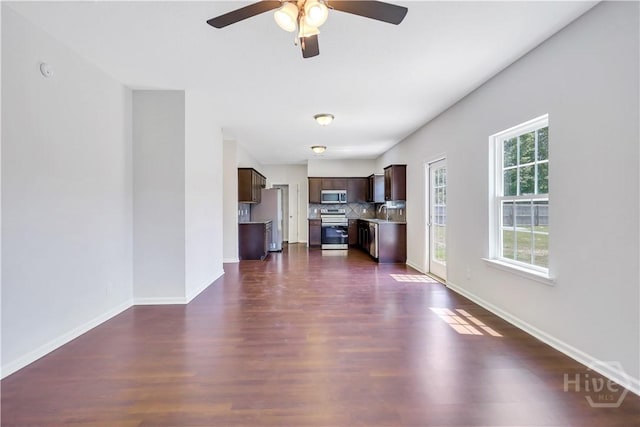 89 NE Morgan Field Blvd, Ludowici, GA 31316 - unfurnished living room featuring ceiling fan and dark wood-style flooring