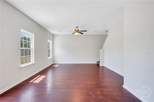 89 NE Morgan Field Blvd, Ludowici, GA 31316 - spare room featuring ceiling fan, stairs, and wood finished floors