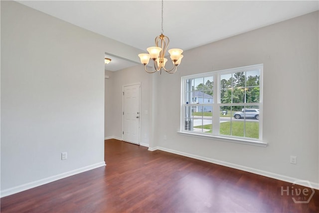 89 NE Morgan Field Blvd, Ludowici, GA 31316 - unfurnished room with a chandelier and wood finished floors