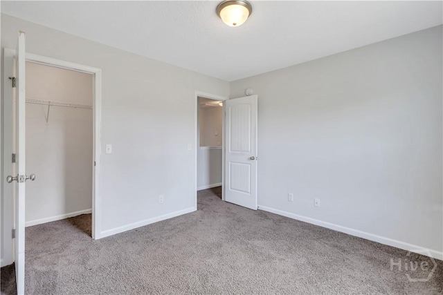 89 NE Morgan Field Blvd, Ludowici, GA 31316 - unfurnished bedroom with carpet, a closet, and a spacious closet