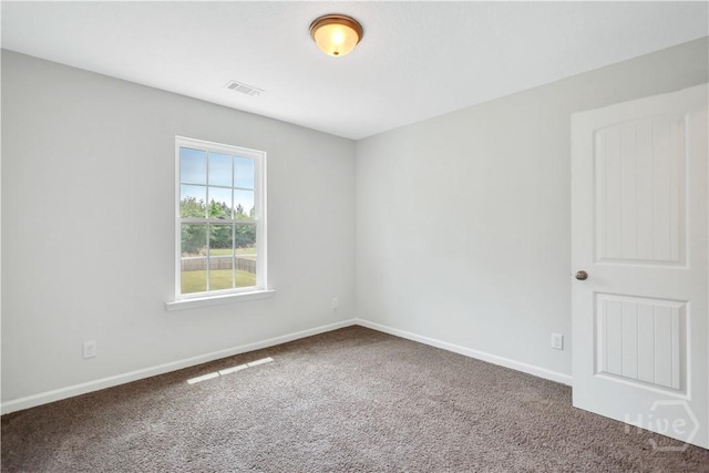 89 NE Morgan Field Blvd, Ludowici, GA 31316 - empty room featuring carpet and baseboards