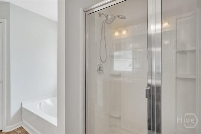 89 NE Morgan Field Blvd, Ludowici, GA 31316 - full bath with a stall shower and a bath