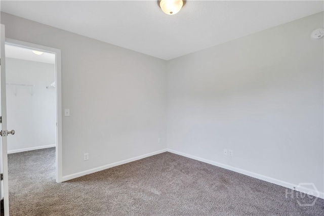 89 NE Morgan Field Blvd, Ludowici, GA 31316 - empty room featuring carpet floors and baseboards