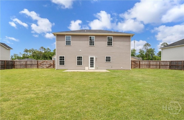 89 NE Morgan Field Blvd, Ludowici, GA 31316 - rear view of property featuring a patio and a fenced backyard
