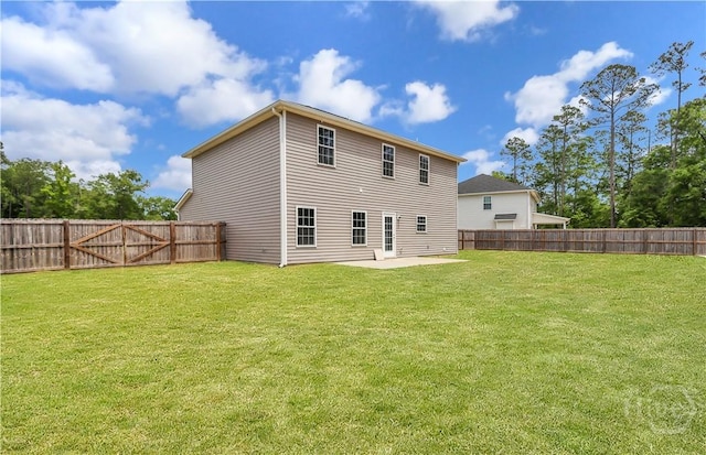 89 NE Morgan Field Blvd, Ludowici, GA 31316 - rear view of property with a patio area and a fenced backyard