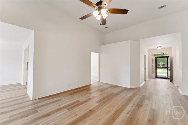 413 Roberts Way, Rincon, GA 31326 - spare room with light wood-style flooring, a ceiling fan, and high vaulted ceiling
