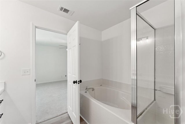 413 Roberts Way, Rincon, GA 31326 - bathroom with a bath and a shower with shower door