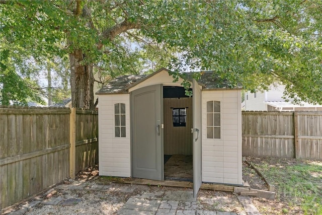 413 Roberts Way, Rincon, GA 31326 - view of shed featuring a fenced backyard