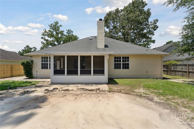 413 Roberts Way, Rincon, GA 31326 - back of house featuring a sunroom and a chimney