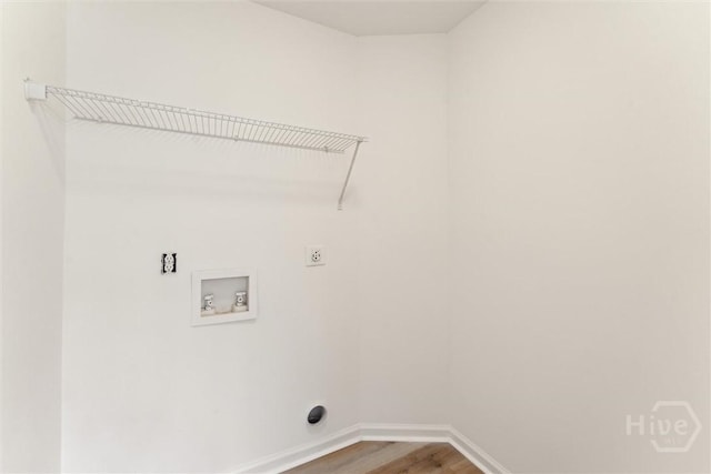 413 Roberts Way, Rincon, GA 31326 - laundry room featuring electric dryer hookup, washer hookup, and wood finished floors