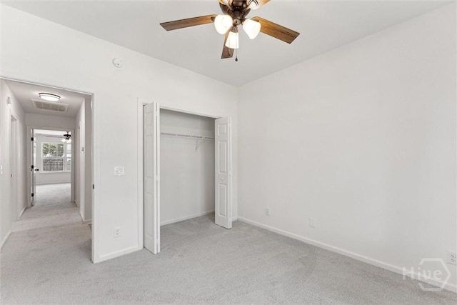 413 Roberts Way, Rincon, GA 31326 - unfurnished bedroom featuring light colored carpet, a closet, and a ceiling fan