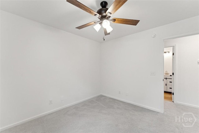 413 Roberts Way, Rincon, GA 31326 - spare room with light colored carpet and a ceiling fan