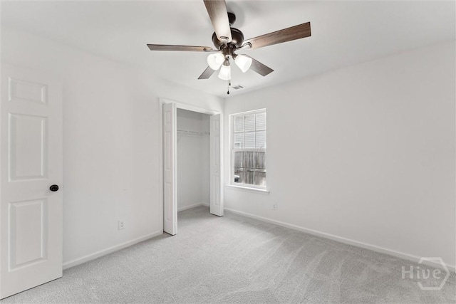 413 Roberts Way, Rincon, GA 31326 - unfurnished bedroom with carpet, a closet, and a ceiling fan