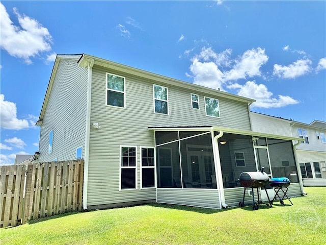134 Melody Dr, Pooler, GA 31322 - rear view of house with a sunroom