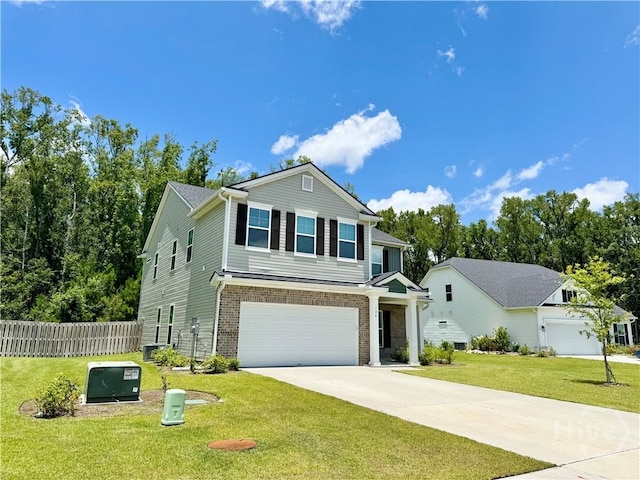 134 Melody Dr, Pooler, GA 31322 - view of front of house with driveway, a garage, and brick siding