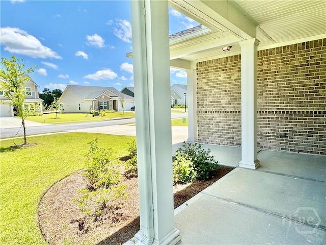 134 Melody Dr, Pooler, GA 31322 - covered porch featuring a lawn and a residential view
