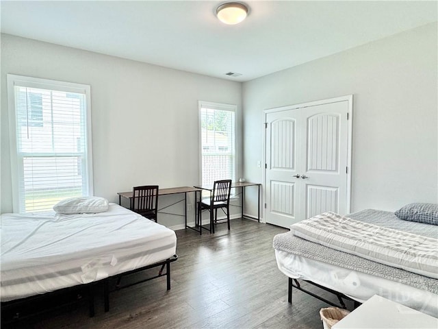 134 Melody Dr, Pooler, GA 31322 - bedroom featuring dark wood-type flooring and a closet