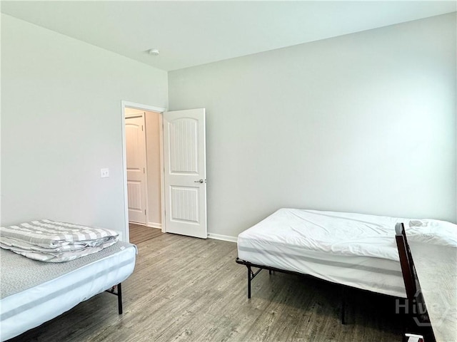 134 Melody Dr, Pooler, GA 31322 - bedroom with wood finished floors and baseboards