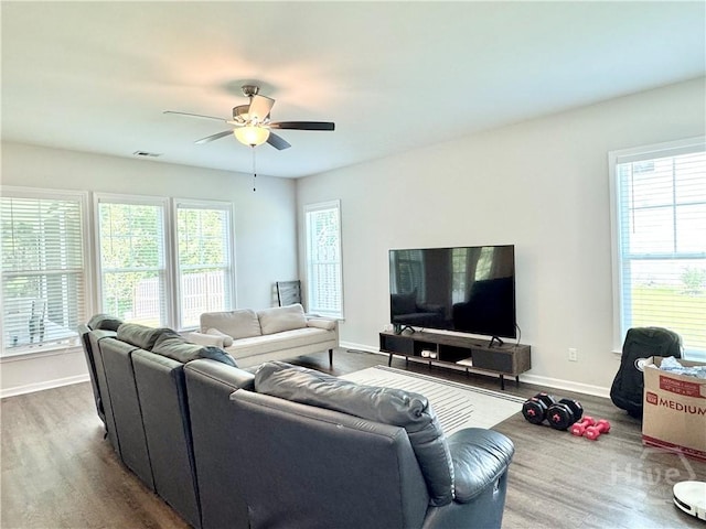 134 Melody Dr, Pooler, GA 31322 - living room with ceiling fan, plenty of natural light, and wood finished floors