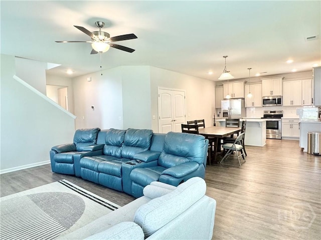 134 Melody Dr, Pooler, GA 31322 - living room with light wood-style flooring, ceiling fan, and recessed lighting